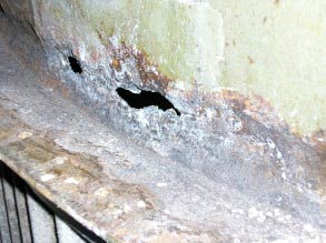 Severe corrosion resulting in through wall defects
